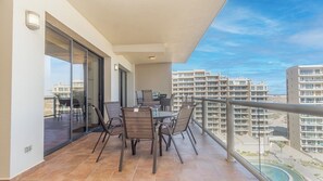Look at those views! Two dining tables on the balcony.