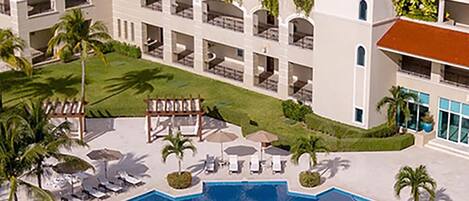 Swimming pool and condo complex.