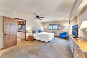 Bedroom 1: Master bedroom, king bed, 50” Smart TV, closet, dresser, en-suite bath, wall mounted a/c unit, upper floor