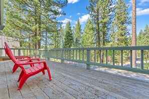 Exterior: Front deck, outdoor chairs, serene forest surrounding