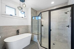 Luxurious bathroom offering both comfort and style for your stay.