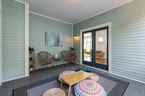 Outdoor seating area on the patio, offering a peaceful retreat just steps away from the living space.
