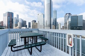 Relax on our beautiful outdoor deck, featuring incredible city views!
