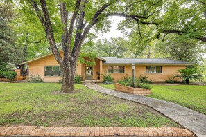 Home Exterior | Outdoor Fireplace | Expansive Backyard