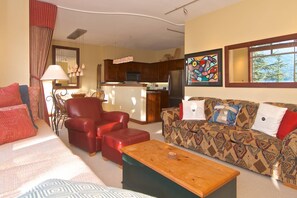 Looking through to kitchen, comfortable seating for whole family