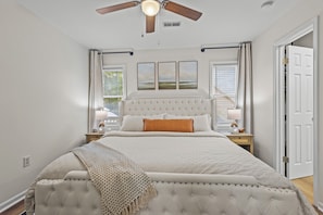 Relax in our inviting bedroom-plush king-sized bed, soft linens, calming decor