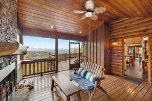 Relax in front of the outdoor fireplace with a nice glass of local North Georgia Mountain wine