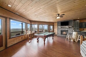 This pet friendly cabin rental in Blue Ridge has a pool table too!