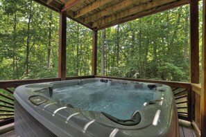 Relax in the hot tub as you enjoy the ambiance of the Blue Ridge Mountains