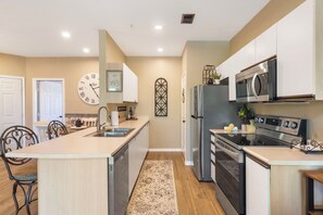 Full kitchen with stainless-steel appliances