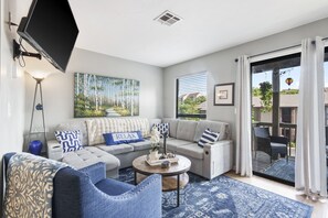 Curl up on the queen sleeper sofa & stream your favorites on the smart TV