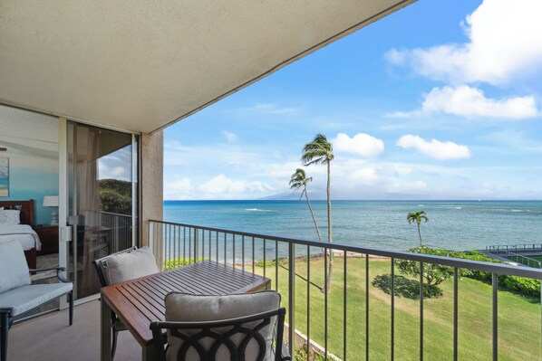 Palm trees and ocean views greet you from the lanai at Royal Kahana 308.