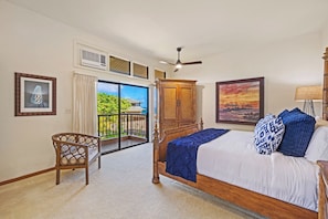 This sunny bedroom at Kapalua Ridge 2321 opens to a private lanai and offers ultimate comfort.