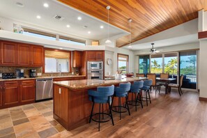 Spacious kitchen with bar seating
