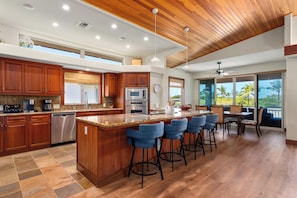 Spacious kitchen with bar seating