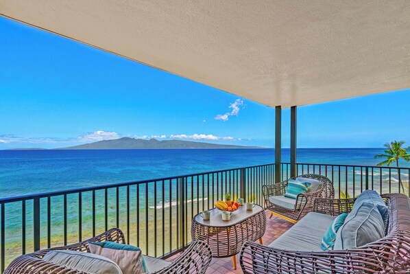 Ocean views await from Kaanapali Shores 702’s lanai—relax in Maui paradise.