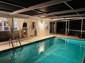Enjoy a night swim with a luxurious backdrop in your palatial heated pool.