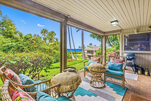 Ocean-view lanai with comfy seating at Wailea Ekolu 1605 – perfect Maui relaxation.