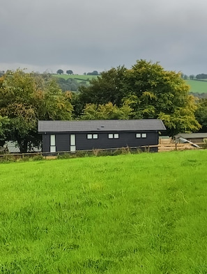 Lodge from our field and Dartmoor in the distance