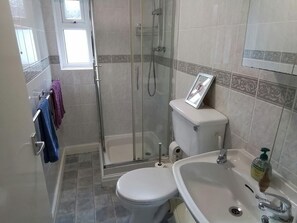 Shower room with walk in shower, wash basin and toilet
