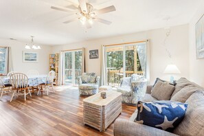 Settle into the cozy Living Area with beautiful interior decor and plenty of plush seating!
