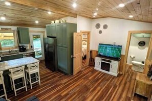 This adorable cabin is fully remodeled to include modern amenities.