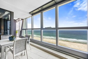 Enjoy your morning coffee in our spacious balcony overlooking the ocean 