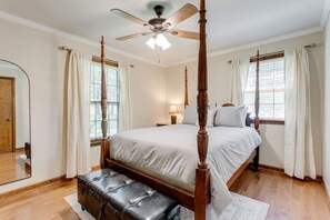 Guest room with a comfortable queen bed across from the primary.