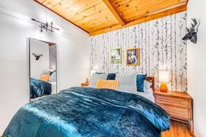 Step into the 2nd Queen bedroom and snuggle in for the night.