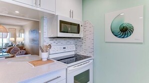 Kitchen - Warm, coastal décor throughout