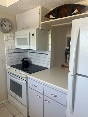 Kitchen - Kitchen with pass-through to dining area
