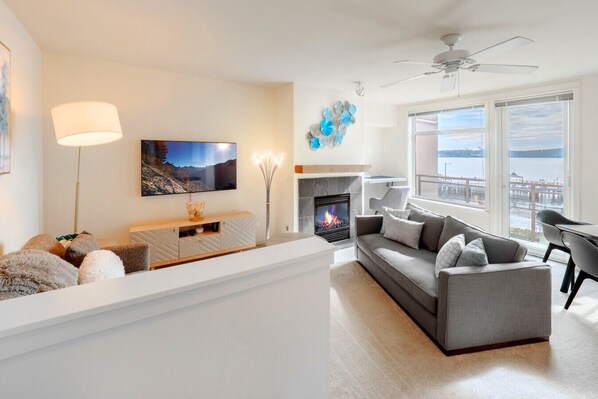 Living Room with double size sofa bed, Smart TV and fireplace