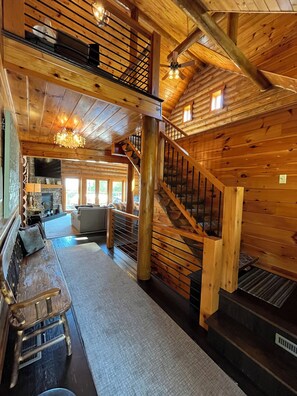Guests will be greeted by beautiful wood work of this authentic log home.