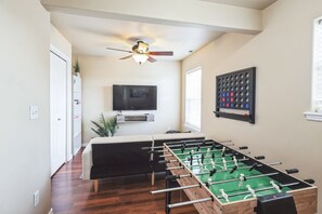 Indoors, Screen, Ceiling Fan, Furniture, Table