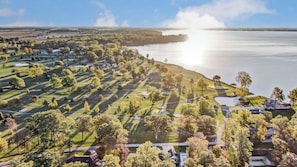 Enjoy stunning views of the golf course and lake from our home.
