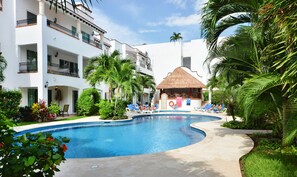 Relax by the pool on sunny days.
