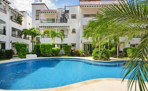 Relax by the pool on sunny days.