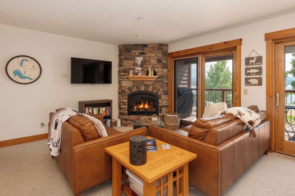 Cozy living room with fireplace and smart TV