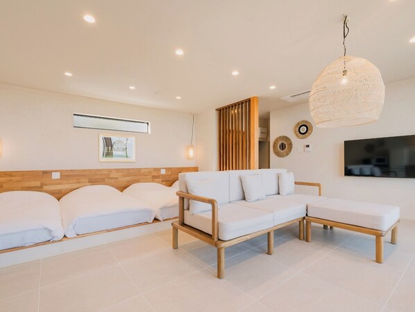 ・[Seminyak] A large screen TV is also installed in the living space.