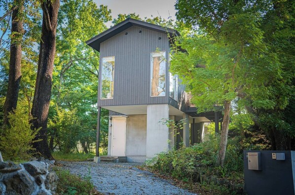 A house surrounded by nature where squirrels can be found