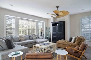 Living area with ample seating and flat screen TV