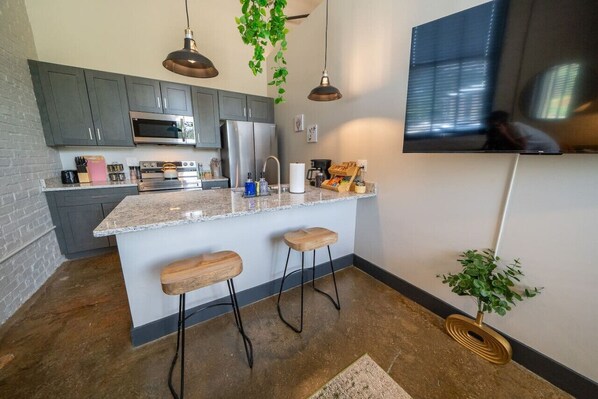 A designated space for enjoying meals, designed for comfort and social interaction.