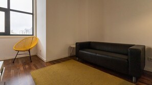 Whether you're sipping coffee by the window or lounging on the sofa, relaxation is guaranteed in our comfortable living area #TV #airbnb
