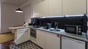 With modern appliances and tasteful design, our kitchenette is the perfect space to cook a delicious snack #practical #colorful