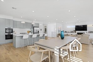 Indoor dining setting for ten and breakfast bar for four