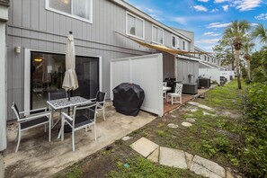 Back patio with grassy area