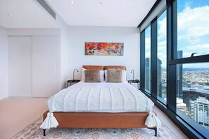 The primary suite is a haven to start and end your day with a plush queen-sized bed and gorgeous views straight from the pillow.
