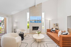 Comfortable living room with 65"smart tv.