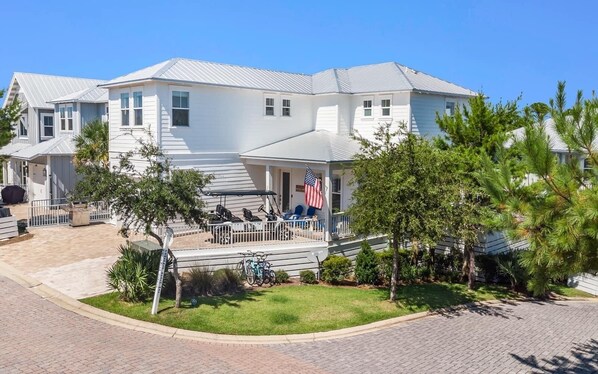 Exterior of the home with driveway and private garage. 