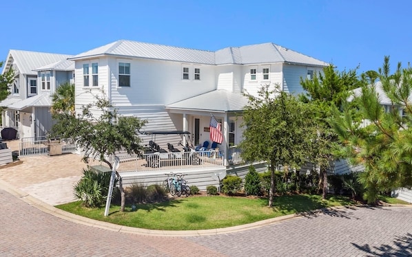 Exterior of the home with driveway and private garage.
